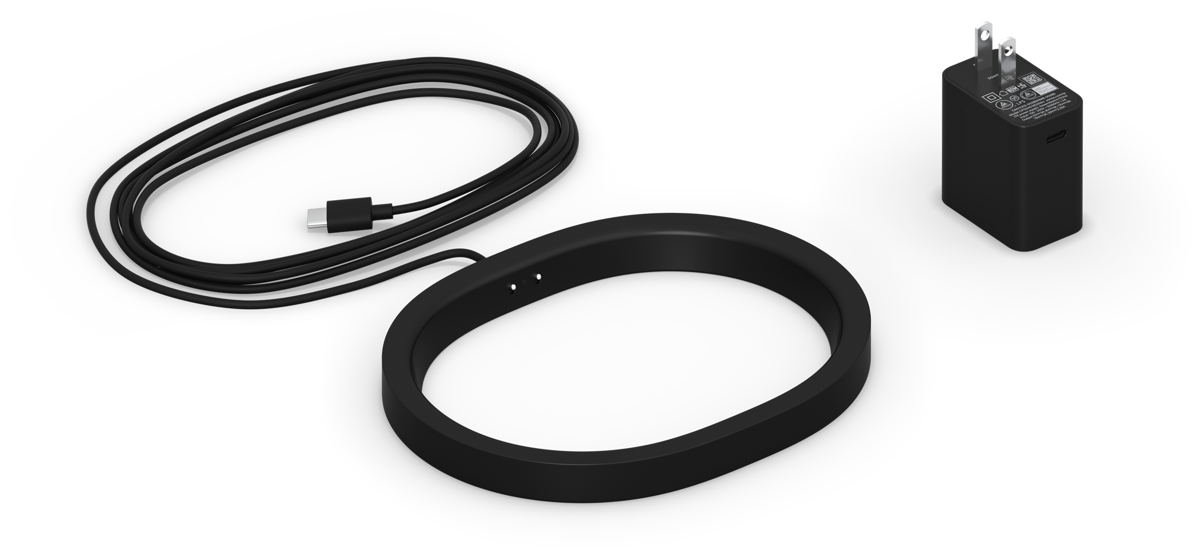 Image of the Move 2 Wireless Charging Base in black, with corresponding regional power plug